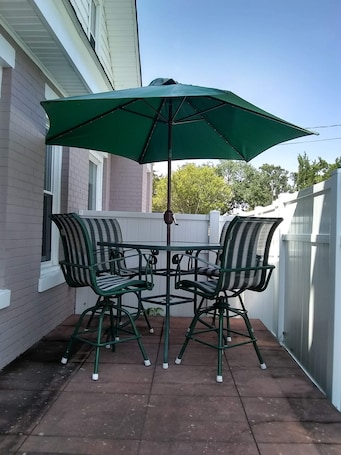 Outdoor dining. Truly Unique! 1938 Historic Beach House