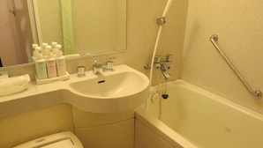A bathroom with a sink, toilet, and bathtub. - Yamagata Eki Nishiguchi Washington Hotel (Yamagata)