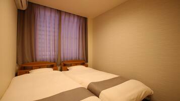 Small Twin Room with City View, 305 (Check in time from 3pm - 10pm) | In-room safe, free WiFi, bed sheets