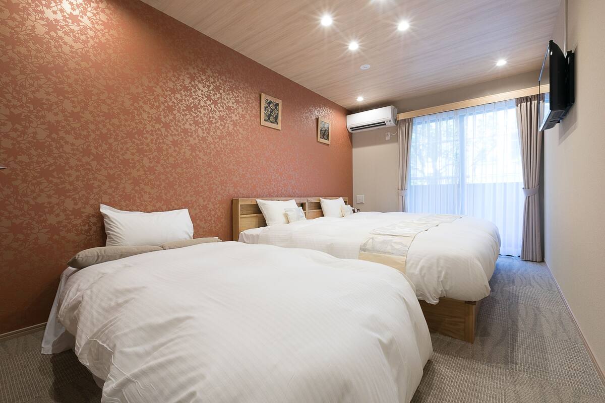 Suite, 2 Bedrooms | Desk, laptop workspace, WiFi (free), bed sheets