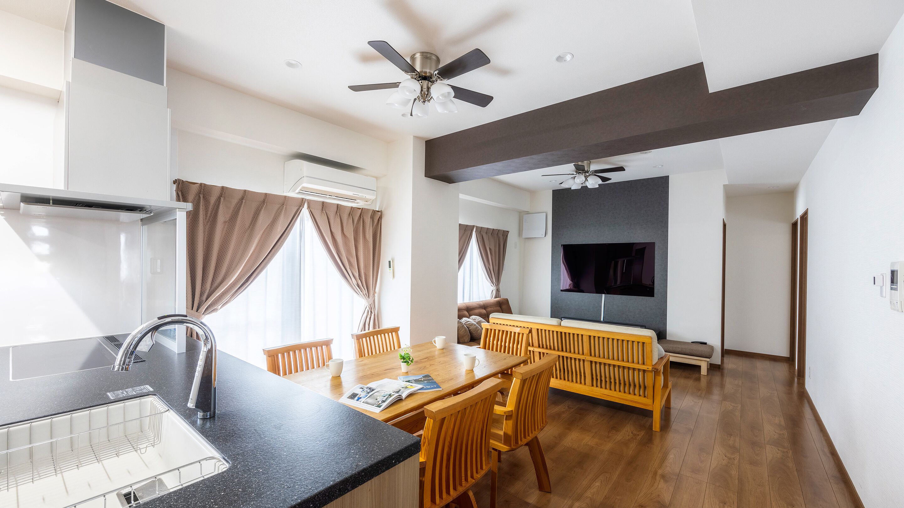 Deluxe Condo | Desk, laptop workspace, blackout drapes, soundproofing