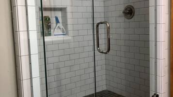 Bathtub, hair dryer, towels, soap