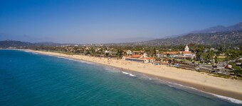 Steps to the Sand: Enjoy beach views & a private fenced yard. Great for families