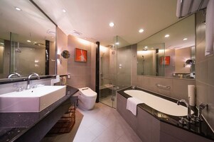 Deep soaking tub, rainfall showerhead, free toiletries, hair dryer