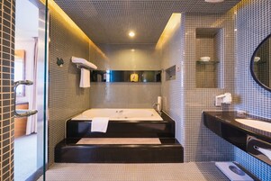 Design Suite | Bathroom | Deep soaking tub, rainfall showerhead, free toiletries, hair dryer