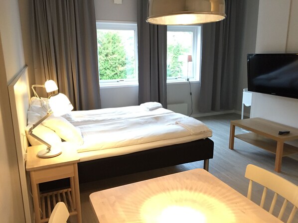 Studio, 2 Single Beds | Blackout curtains, free WiFi, bed sheets - Vallabiten Apartments via Hotel Esplanad (Växjö)