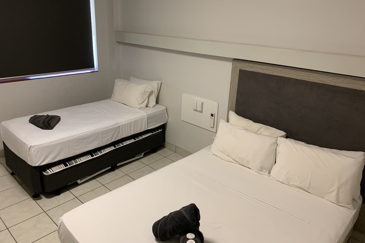 Deluxe Studio, Multiple Beds, Refrigerator & Microwave, Pool View | 1 bedroom, blackout drapes, iron/ironing board, WiFi (free)