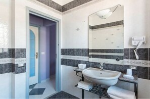 Free toiletries, hair dryer, bidet, towels