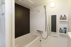 Apartment Room 402 | Bathroom | Separate tub and shower, deep soaking tub, free toiletries, hair dryer - JESUS SQUARE Nippombashi (Osaka)
