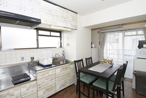 Apartment Room 202 | Private kitchenette | Fridge, microwave, stovetop, electric kettle