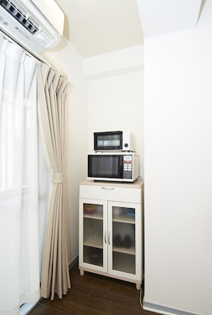 Apartment Room 201 | Private kitchenette | Fridge, microwave, stovetop, electric kettle