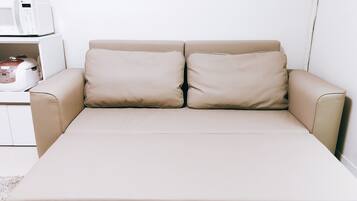 City Apartment, Multiple Beds, Non Smoking | Living room | Flat-screen TV