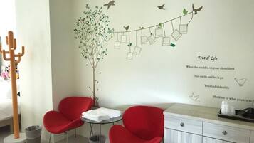 Desk, blackout curtains, soundproofing, rollaway beds