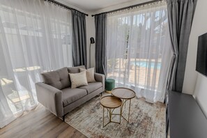 Chambre familiale | Coffre-fort, fer et planche à repasser, accès au Wi-Fi (inclus)