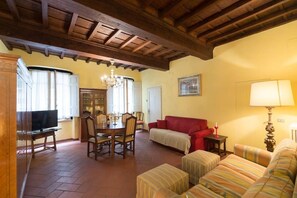 Appartamento, 1 camera da letto, non fumatori | Area soggiorno | TV a schermo piatto