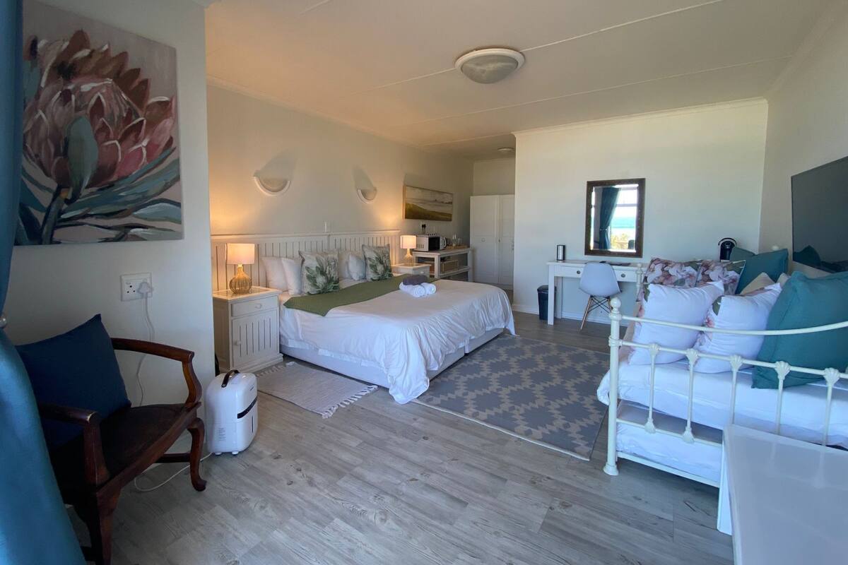 Comfort Quadruple Room, 1 Bedroom, Ocean View, Ground Floor | In-room safe, free WiFi, bed sheets