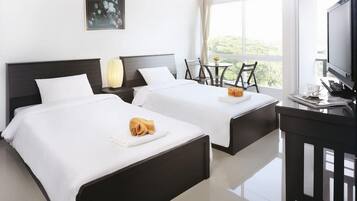 スタンダード ツインルーム シングルベッド 2 台 | WiFi (無料)、ベッドシーツ