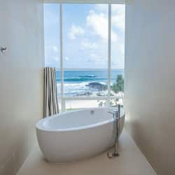 Mayil | Bathroom | Designer toiletries, hair dryer, bathrobes, slippers