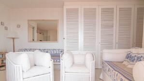 Apartment, 1 Bedroom | Living area - Portisco - WR Apartments (Olbia)