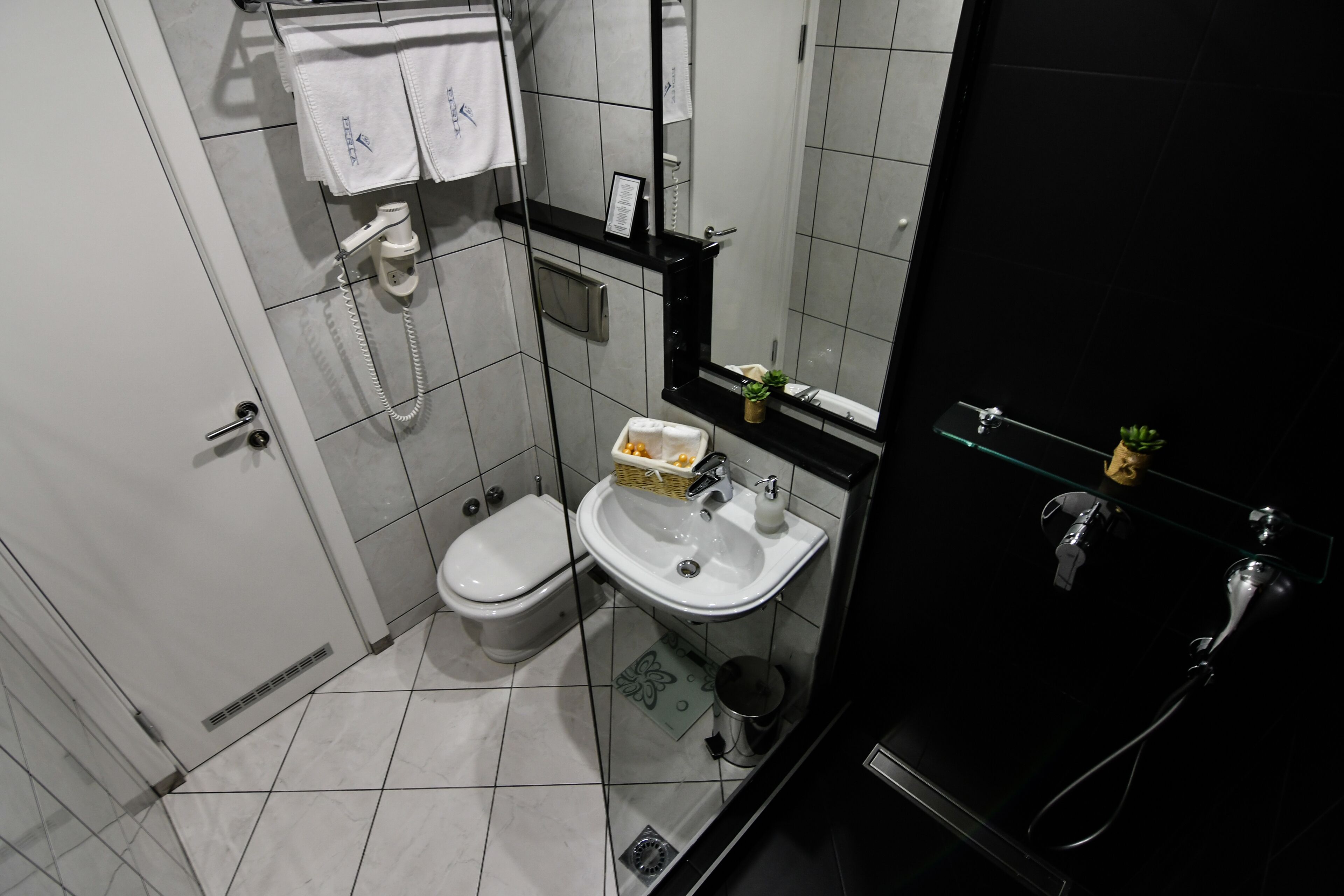 hydromassage showerhead, designer toiletries, hair dryer, bathrobes