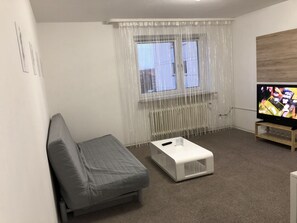 Apartamento | Sala de estar | TV de plasma