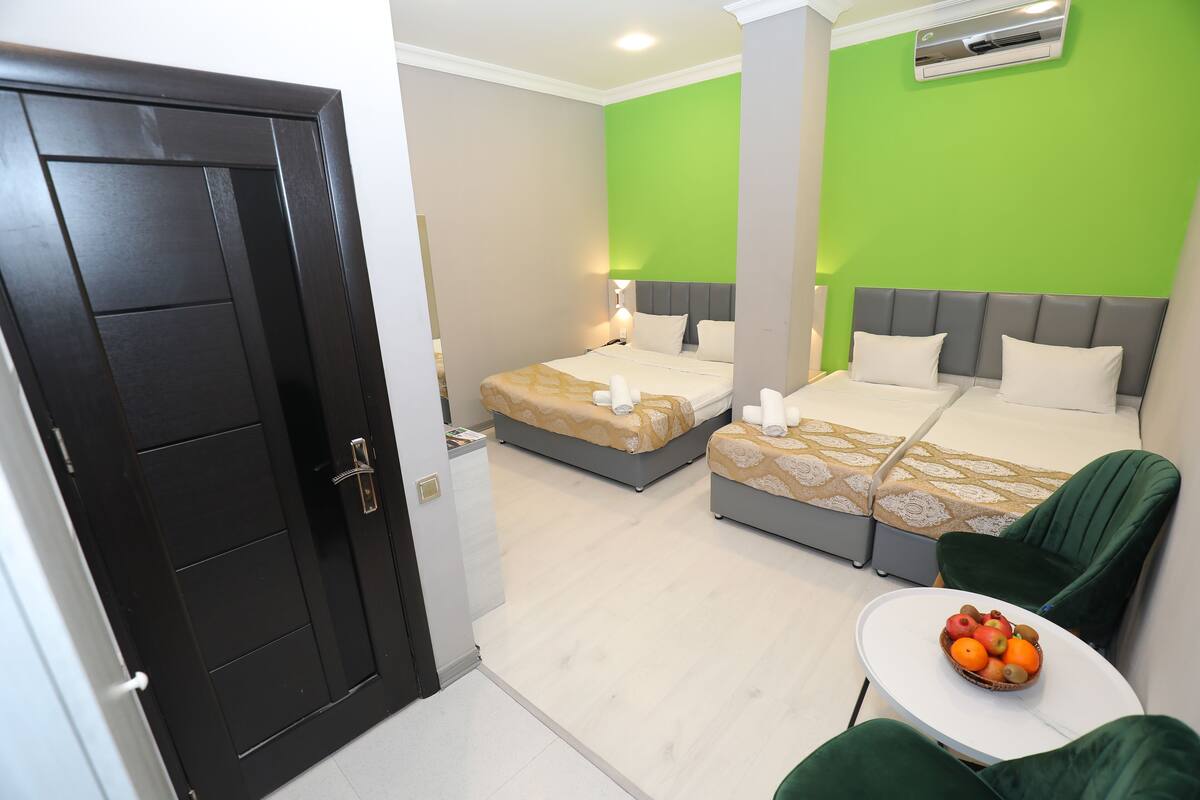 Elite Quadruple Room | Egyptian cotton sheets, premium bedding, down duvets, memory-foam beds