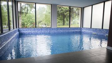 Indoor pool, outdoor pool, open 11 AM to 7 PM, sun loungers