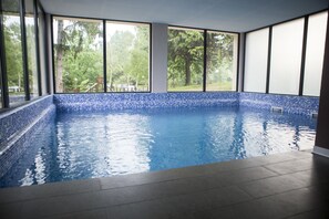 Indoor pool, outdoor pool, open 11 AM to 7 PM, sun loungers
