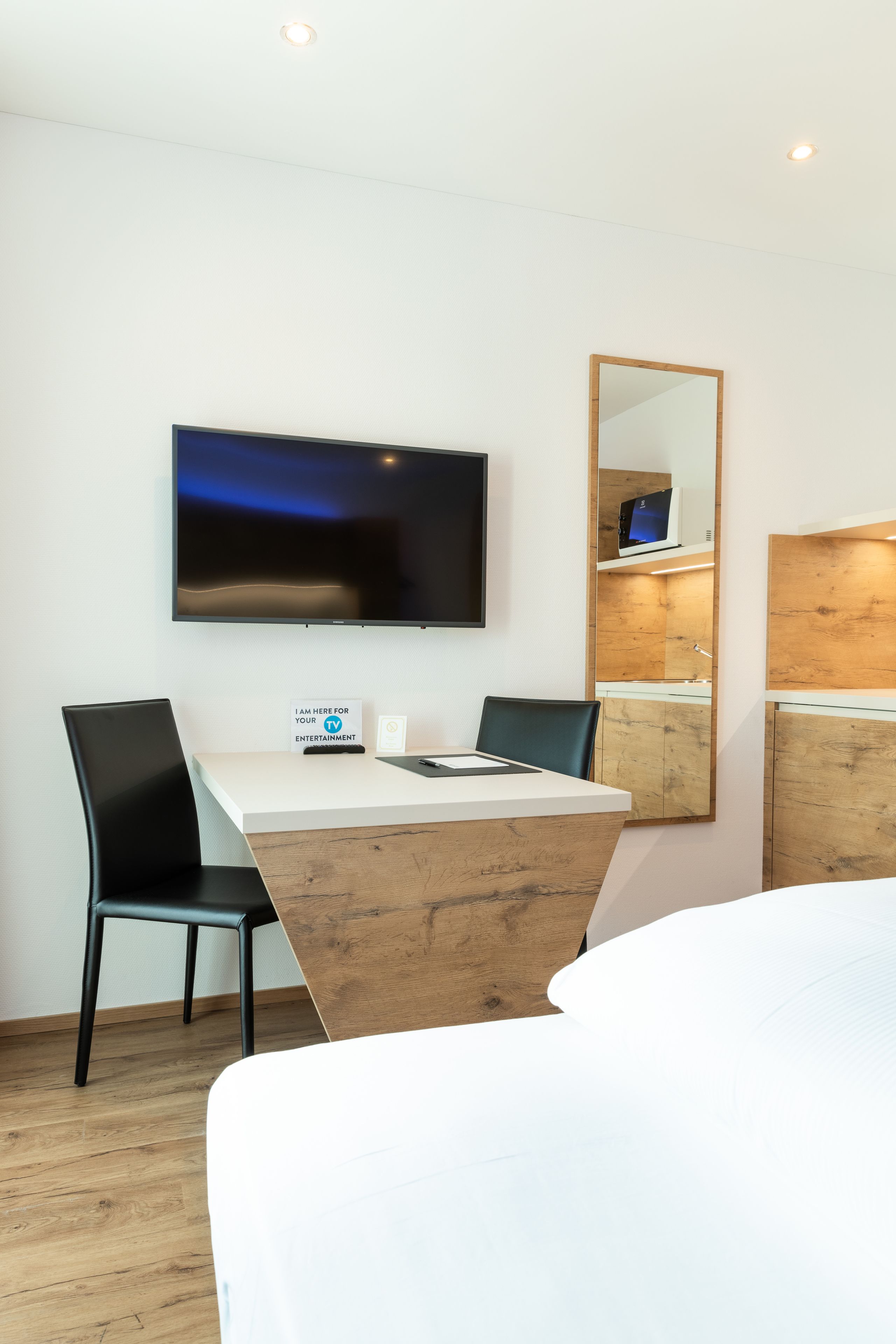 business single room | desk, laptop workspace, blackout curtains, soundproofing