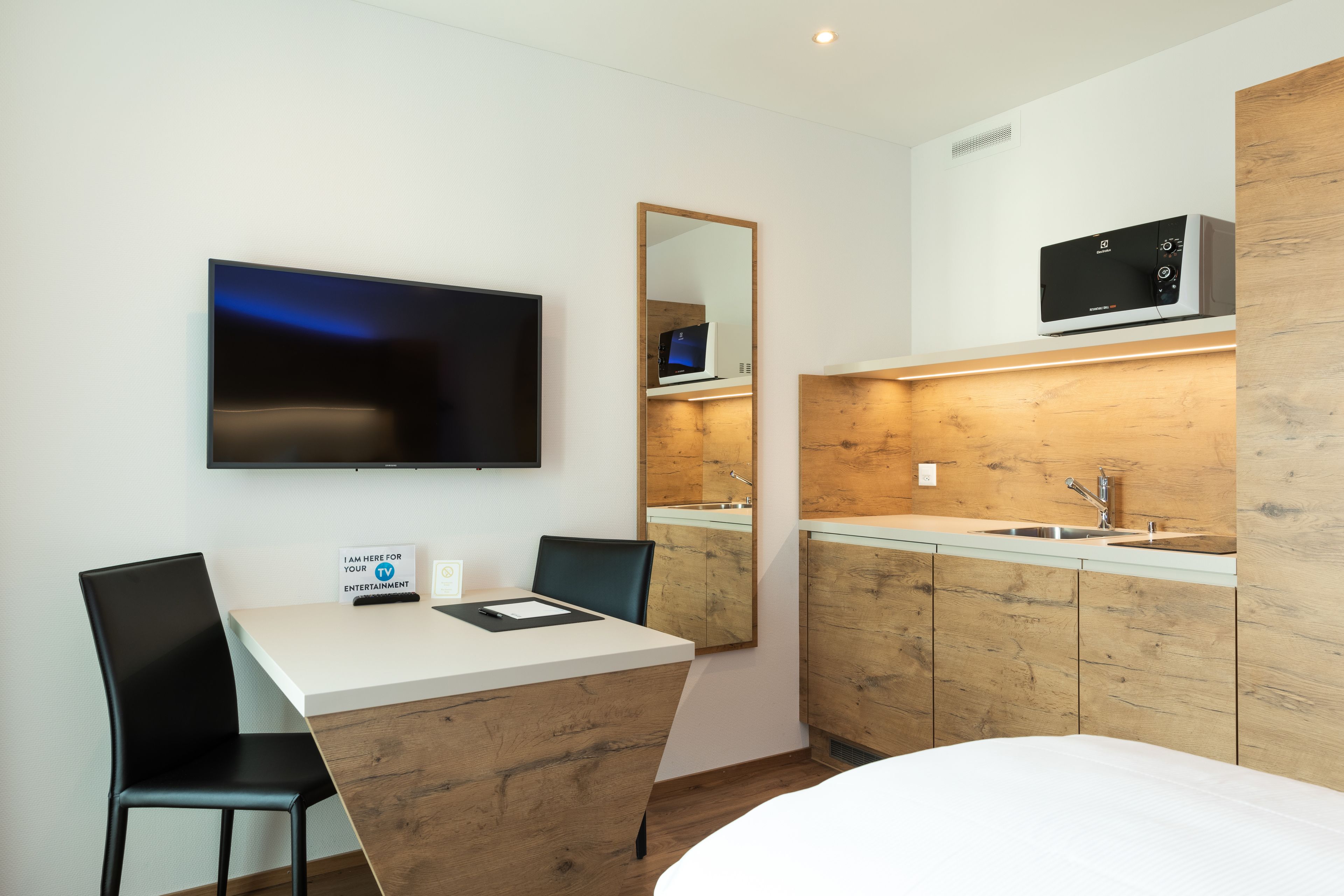 business single room | desk, laptop workspace, blackout curtains, soundproofing