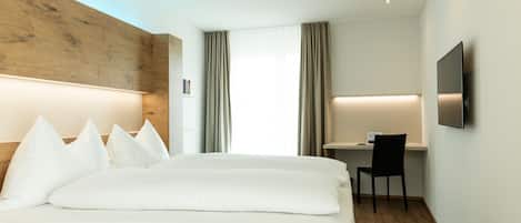 Chambre Deluxe double ou avec lits jumeaux | 1 chambre, bureau, espace de travail pour ordinateurs portables