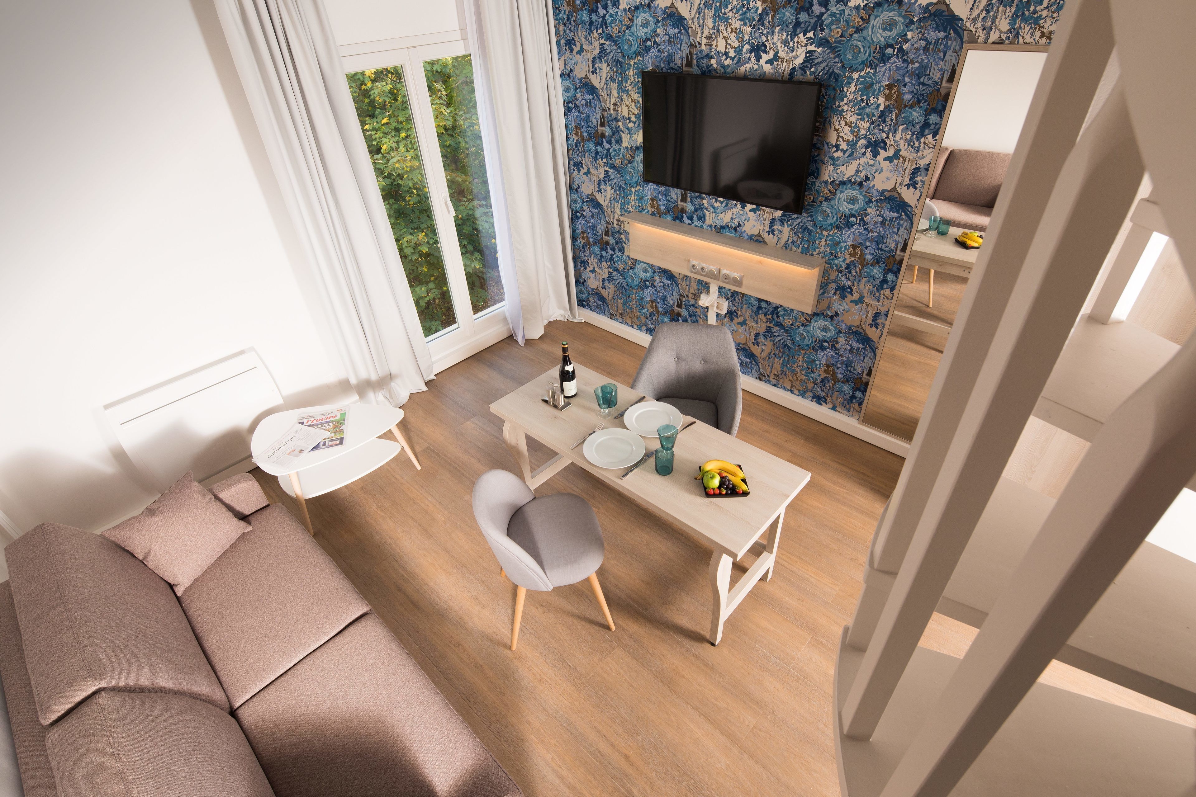 junior suite, 1 bedroom, kitchenette | in-room safe, individually decorated, individually furnished, desk