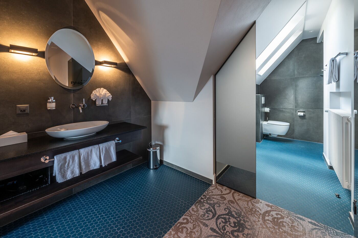 junior suite, city view (design) | bathroom | hair dryer, bathrobes, slippers, towels