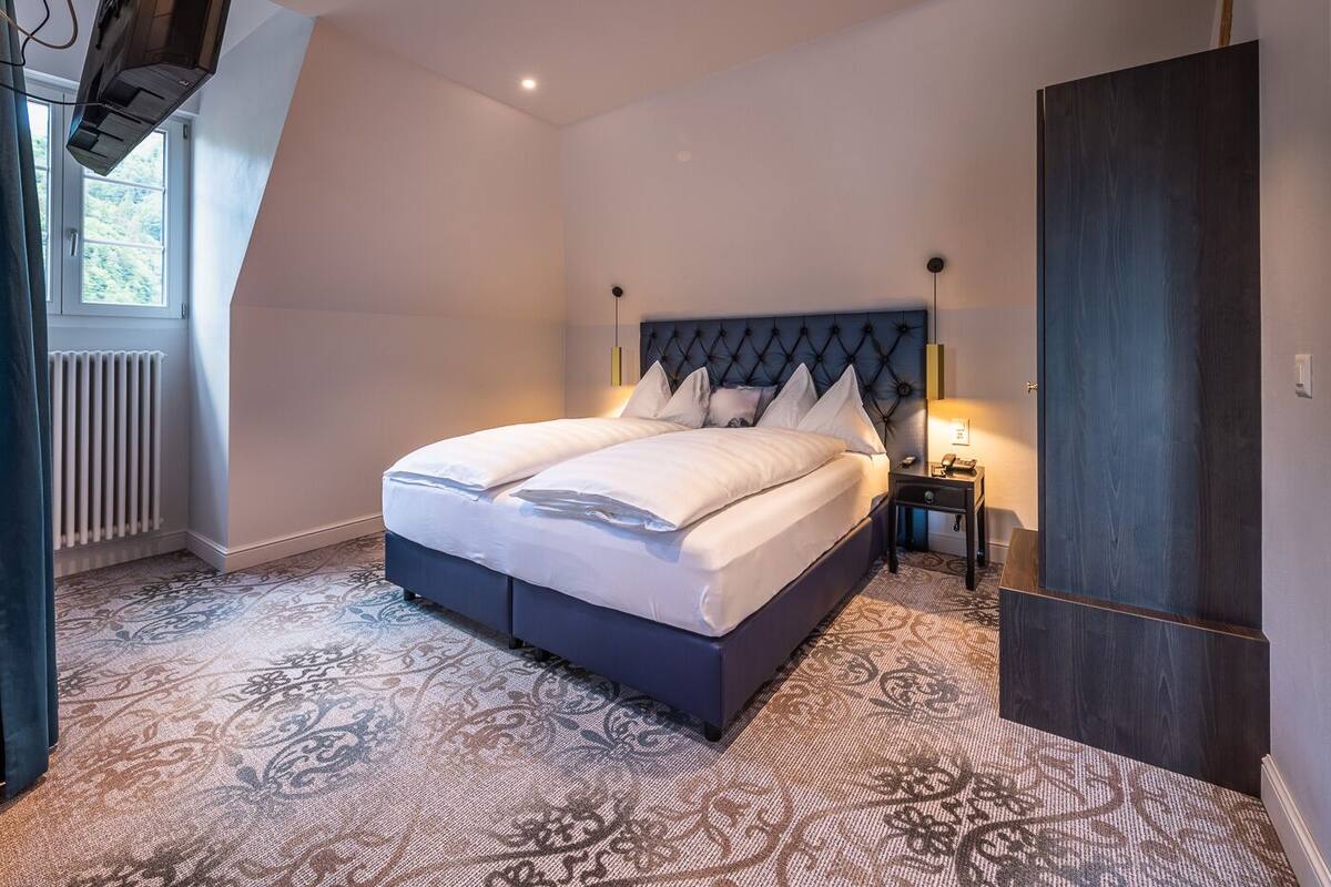Suite junior, vistas a la ciudad (Design) | Caja fuerte, escritorio, wifi gratis y ropa de cama