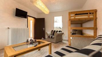 Traditional Chalet, 3 Bedrooms, Non Smoking, Ground Floor (incl. final cleaning fee 95 EUR) | Living area | 45-inch LCD TV with satellite channels, TV