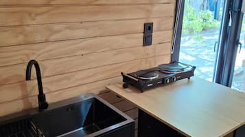 Exklusivt loft | Eget kök | Kylskåp, mikrovågsugn, spishäll och kaffe- och tebryggare