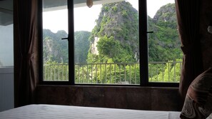 Family Room | In-room safe, individually decorated, individually furnished, desk - Limestone Boutique Hotel (Hoa Lu)