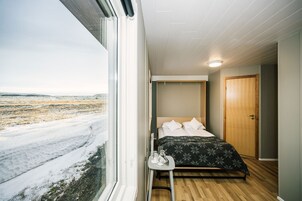 Family Quadruple Room | Blackout drapes, free WiFi