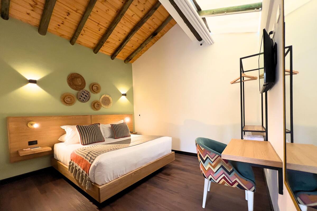 Down duvets, desk, iron/ironing board (on request), free WiFi