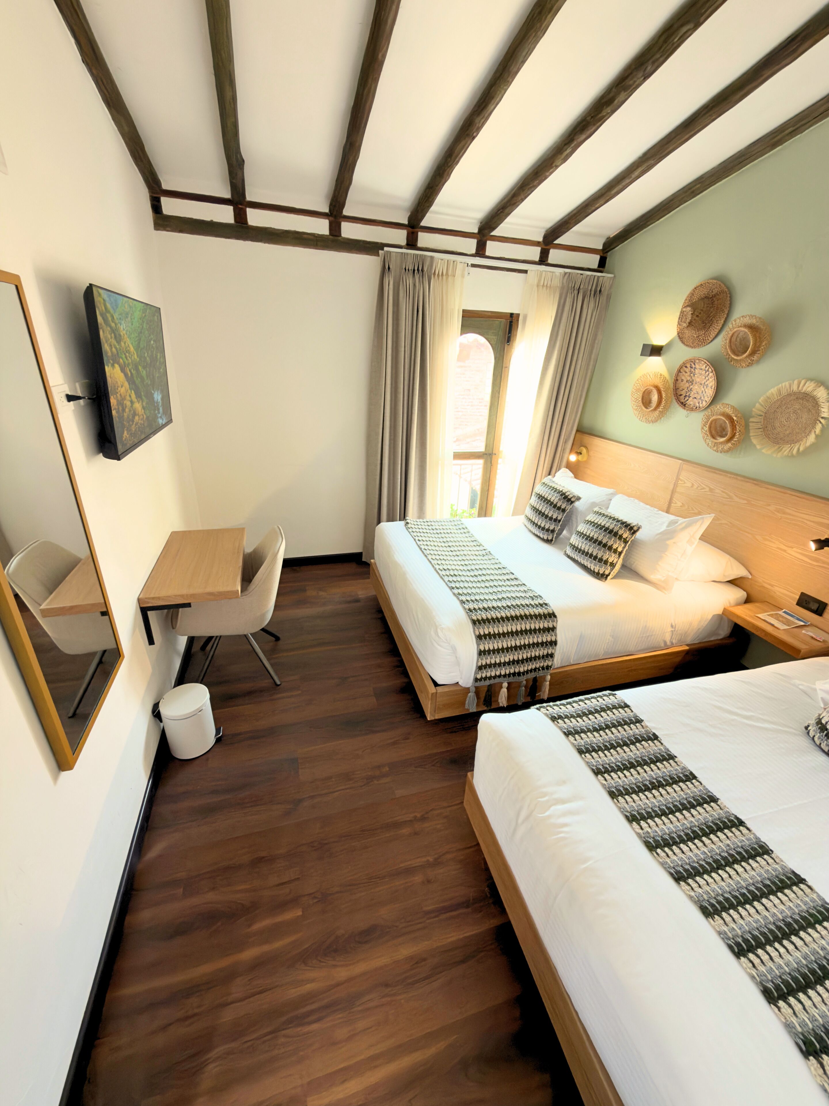 Superior Triple Room, City View | Down comforters, desk, iron/ironing board (on request), WiFi (free)