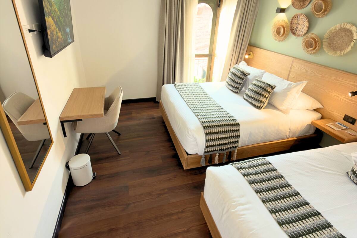 Down duvets, desk, iron/ironing board (on request), free WiFi