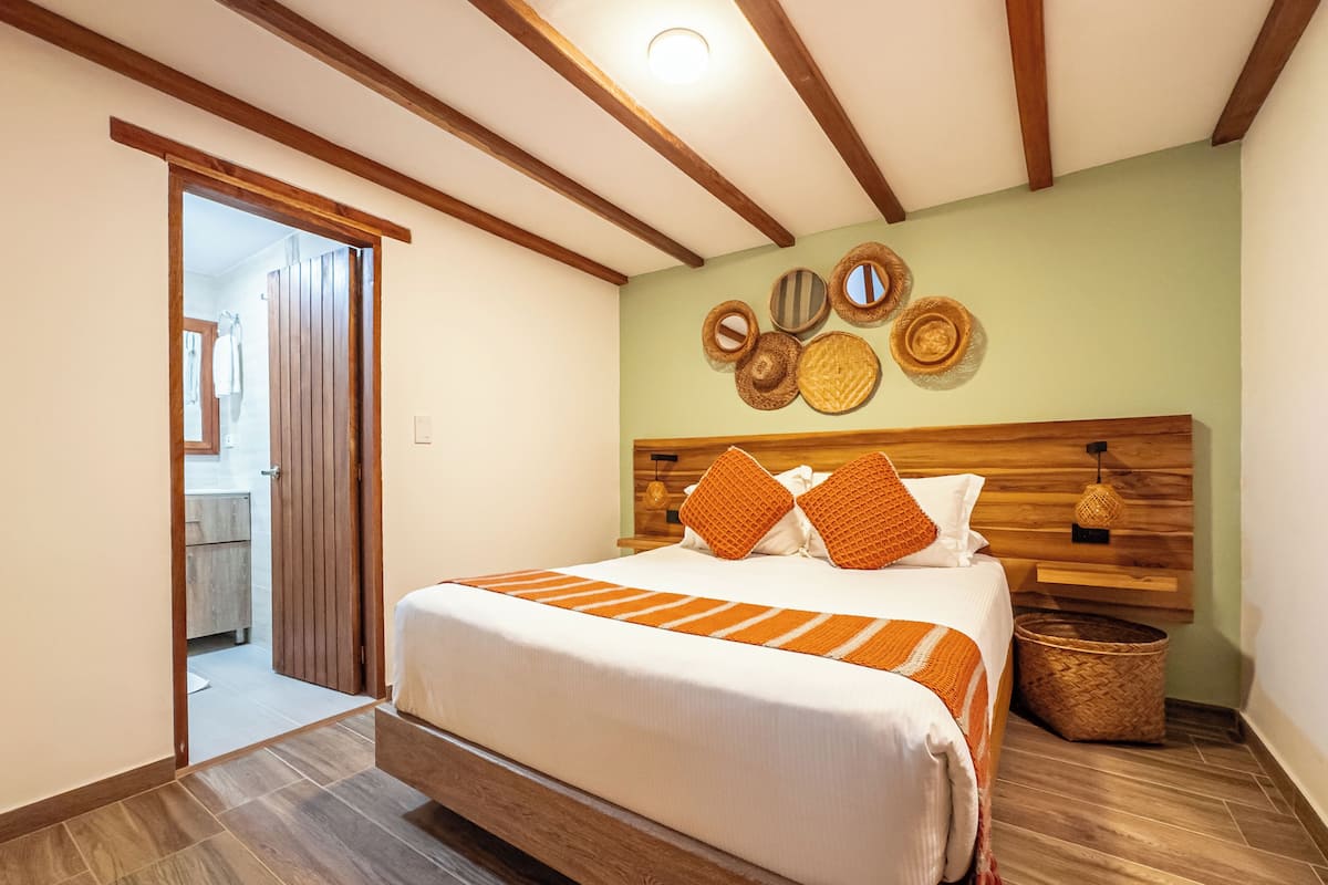 Economy Double Room | Down comforters, individually decorated, desk, iron/ironing board