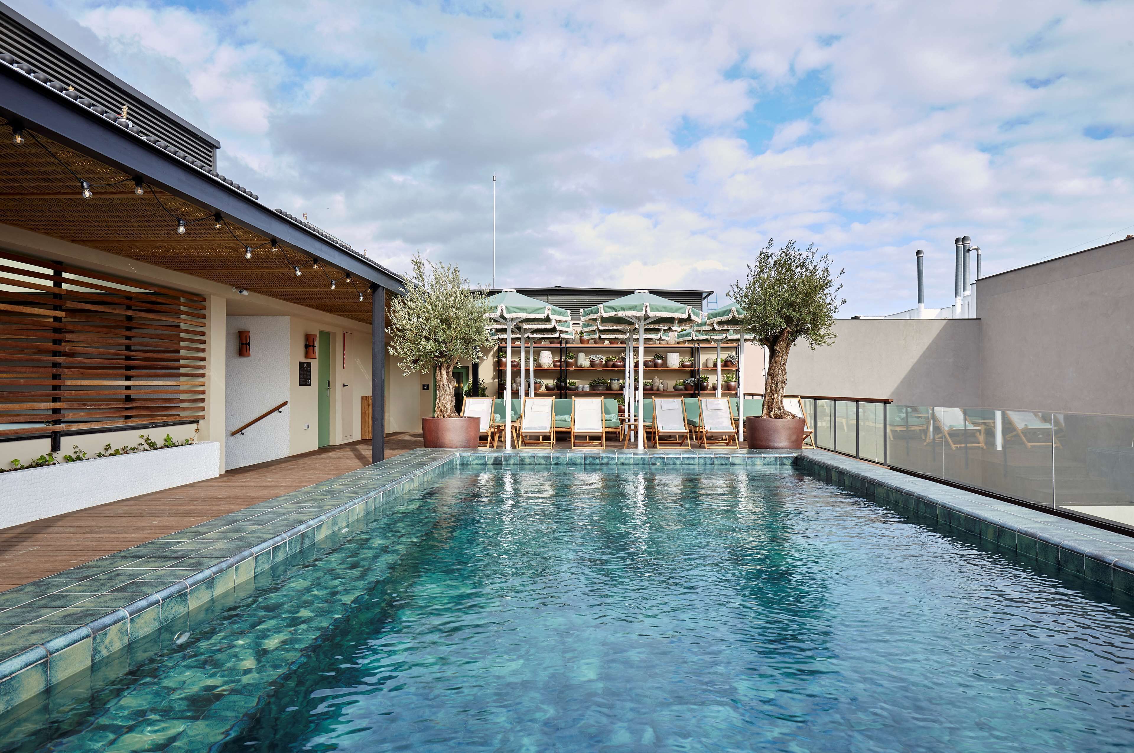 outdoor pool, open 10 am to 8 pm, pool loungers