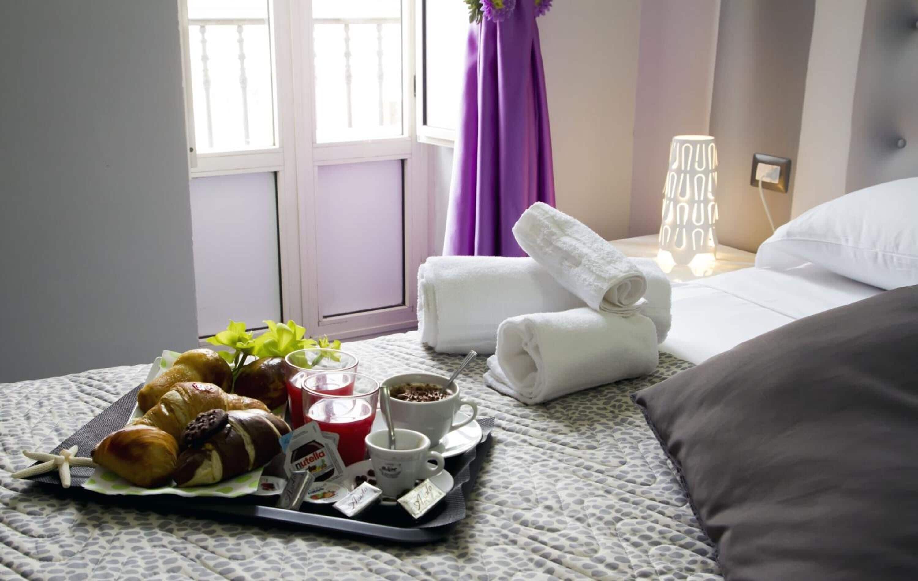 Lakens van Egyptisch katoen, luxe beddengoed, donsdekens, een minibar