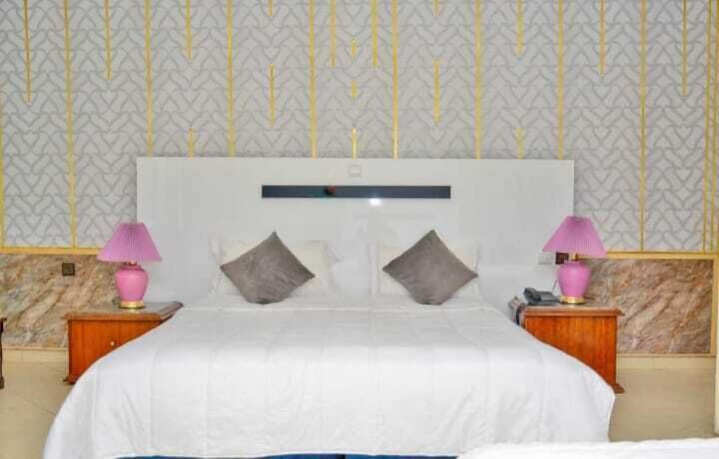 Minibar, desk, blackout drapes, iron/ironing board