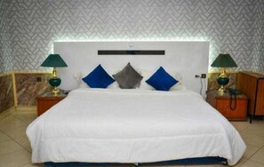 Standard Single Room | Minibar, desk, blackout drapes, iron/ironing board - Free Zone Hotel (Hjar Ennhal)