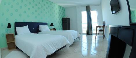 Minibar, desk, blackout curtains, iron/ironing board