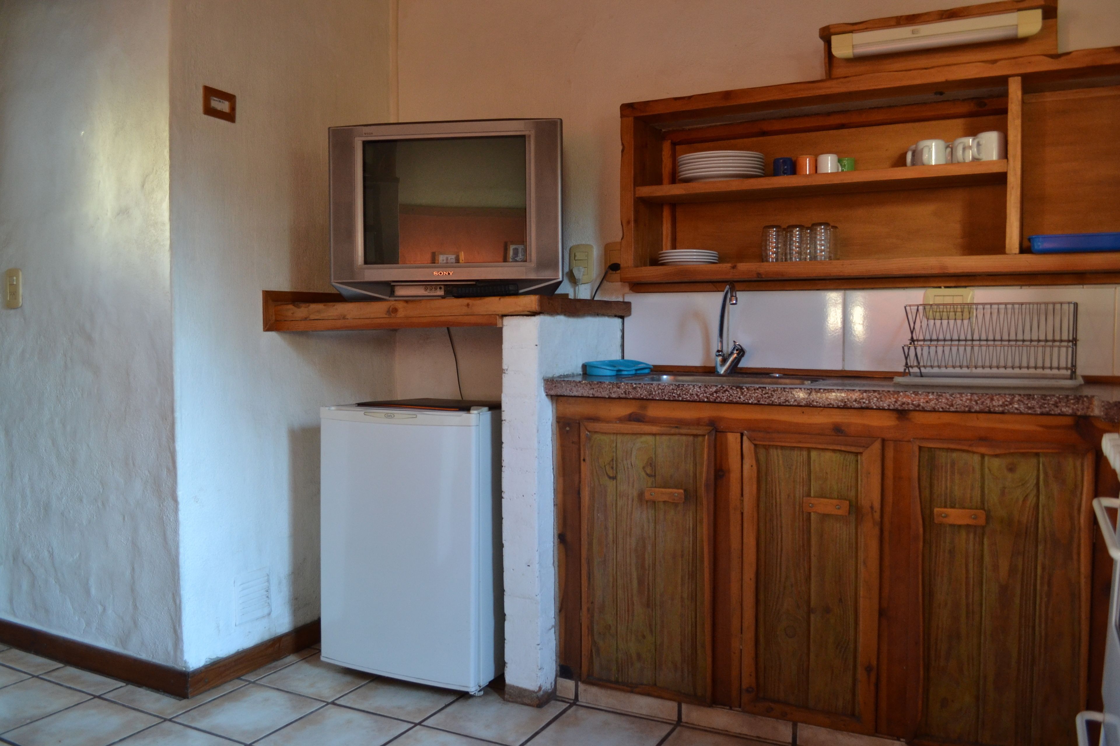 Classic Cabin | Private kitchen | Fridge, microwave, stovetop, cookware/dishes/utensils