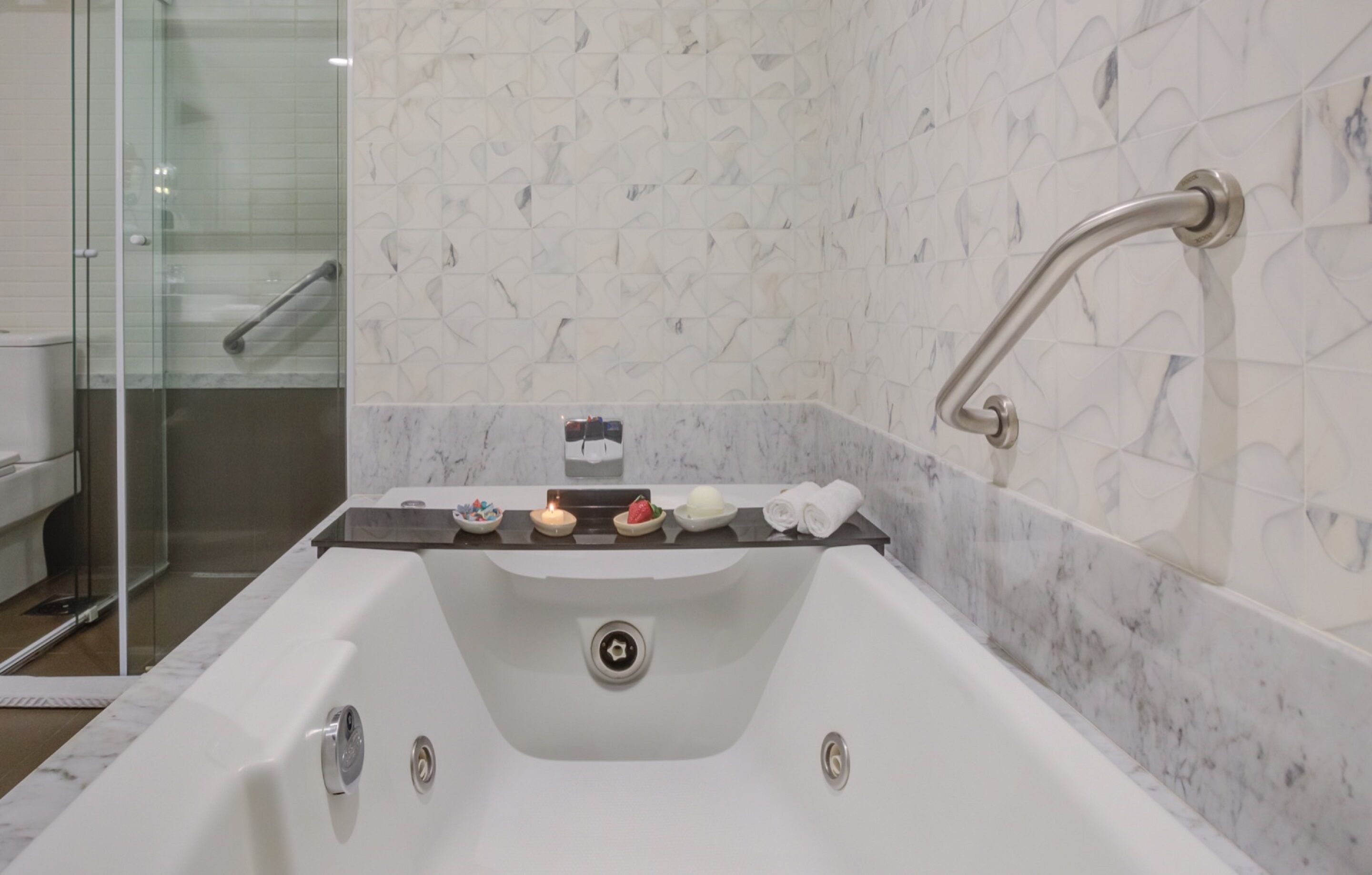premium suite | bathroom | shower, rainfall showerhead, hair dryer, towels
