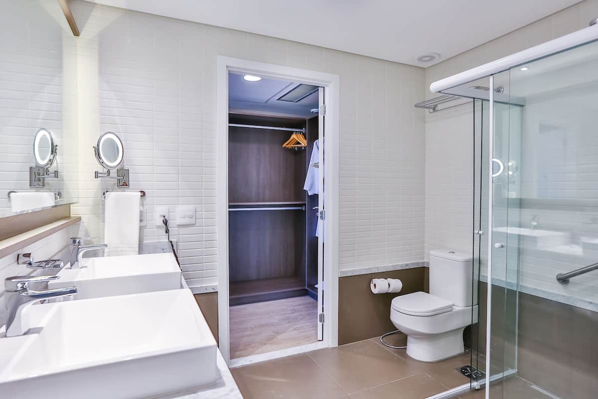 premium suite | bathroom | shower, rainfall showerhead, hair dryer, towels